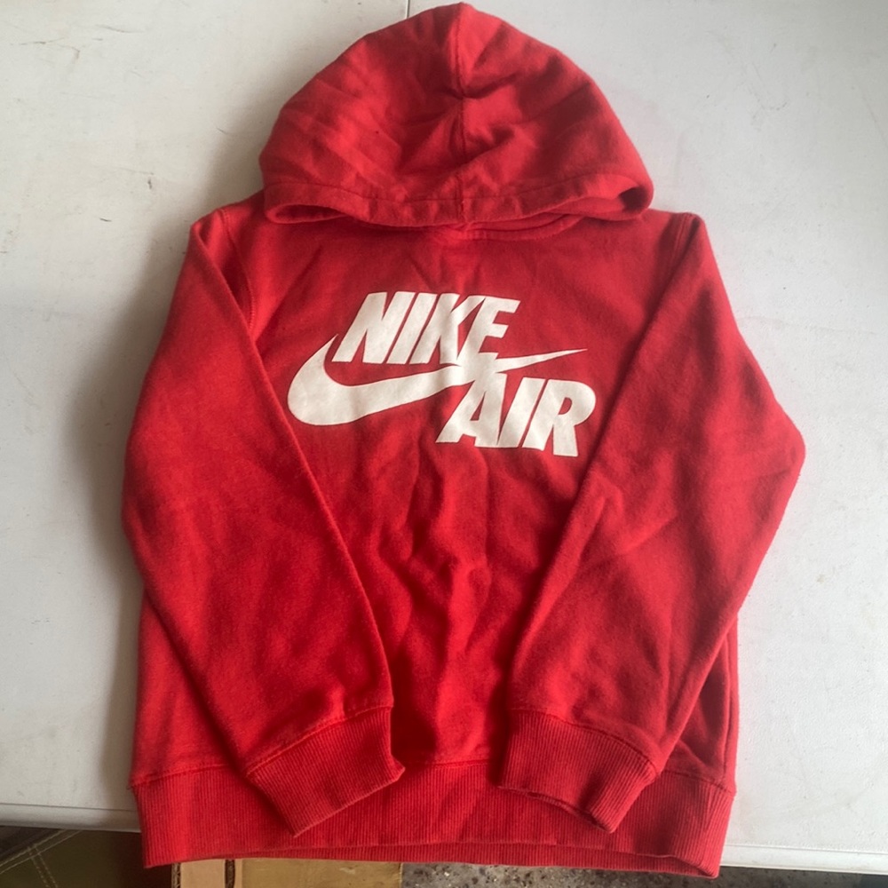 Red Nike sweatshirt size 7. Like new.